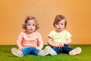 happy funny girl twins sisters playing laughing happy funny girl twins sisters playing laughing