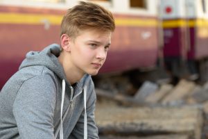 portrait young handsome teenage boy railway train station portrait young handsome teenage boy railway train station